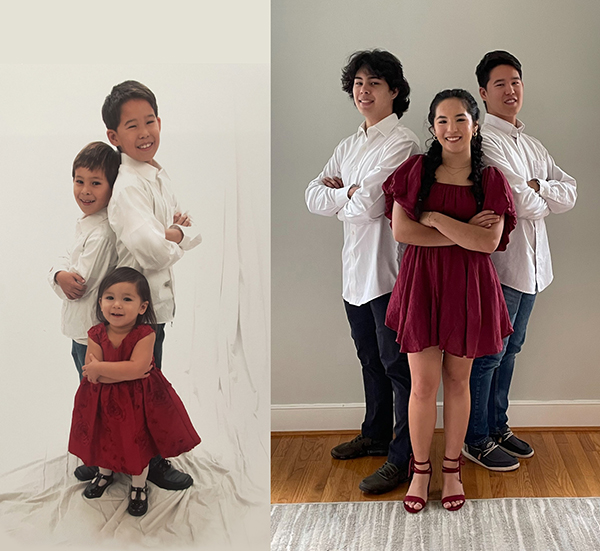 Three siblings, boys in white shirts and jeans, and girl in red dress, together recreating a photo taken when they were young kids.