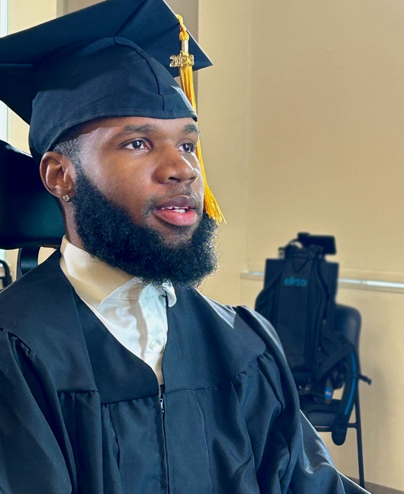 Khalil Watson wearing his graduation cap and gown