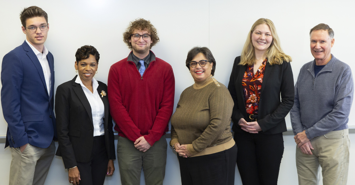 The winning team, E.E.P. Homes, poses with Judges Battle and Lewandowski, along with Dr. Bowers